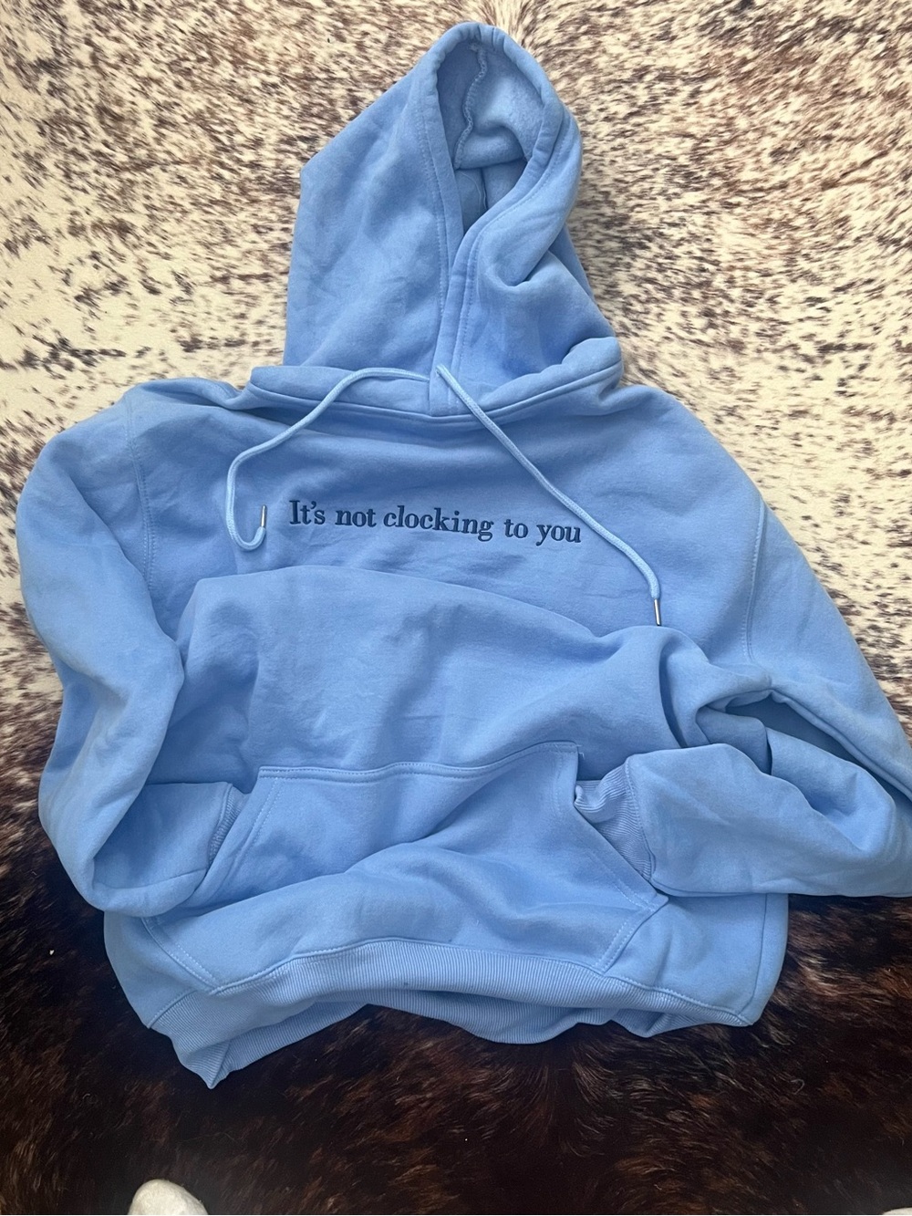Light Blue Graphic Hoodie - "It's not clocking to you"